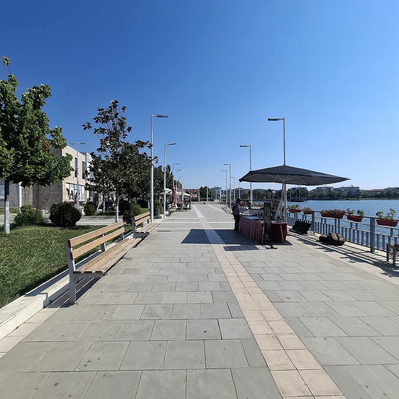 Main square of Belsh in Albania in summer.