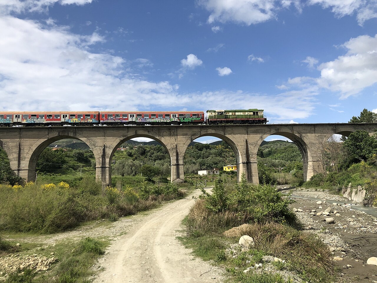 A train crossing a bridge in Central Albania