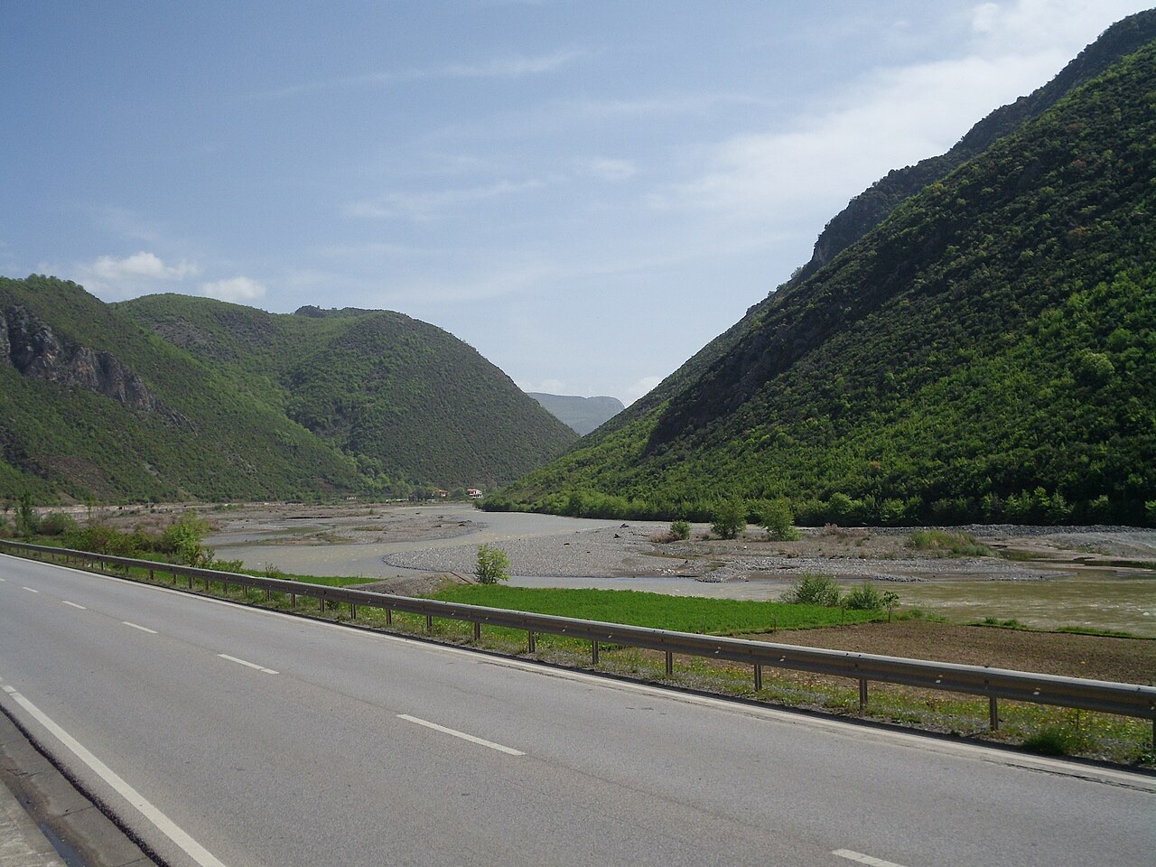 A valley of the Shkumbin river in Albania, as seen from a train between Elbasan and Librazhd