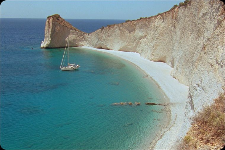 Grama Bay: a white pebble cove under sheer cliffs
