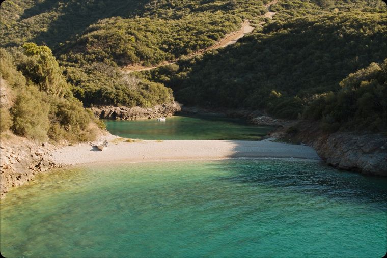 Kakome Bay: a deep clear bay with a pebble shore