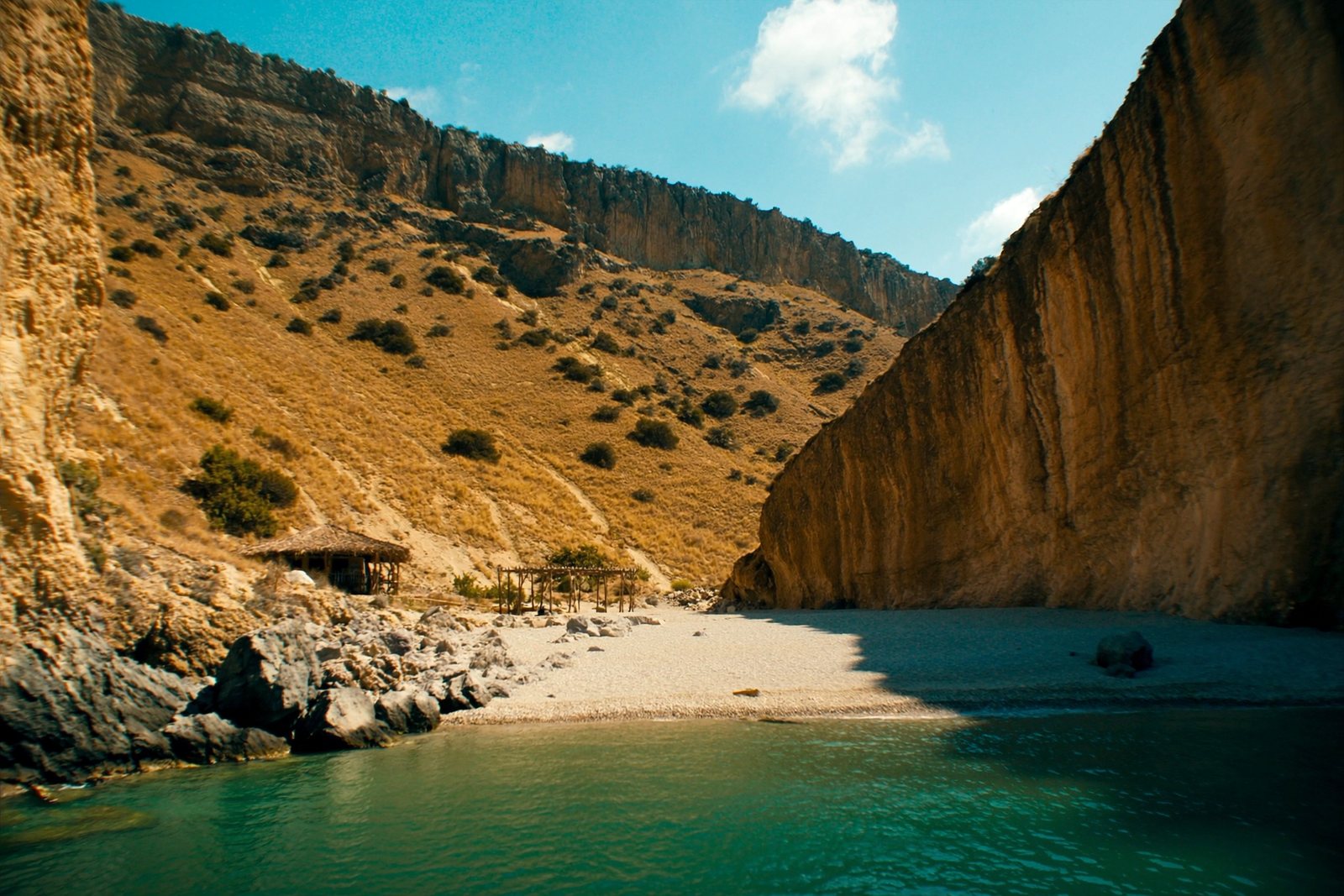 Gjipe Beach: a pebble cove where a limestone canyon meets the sea