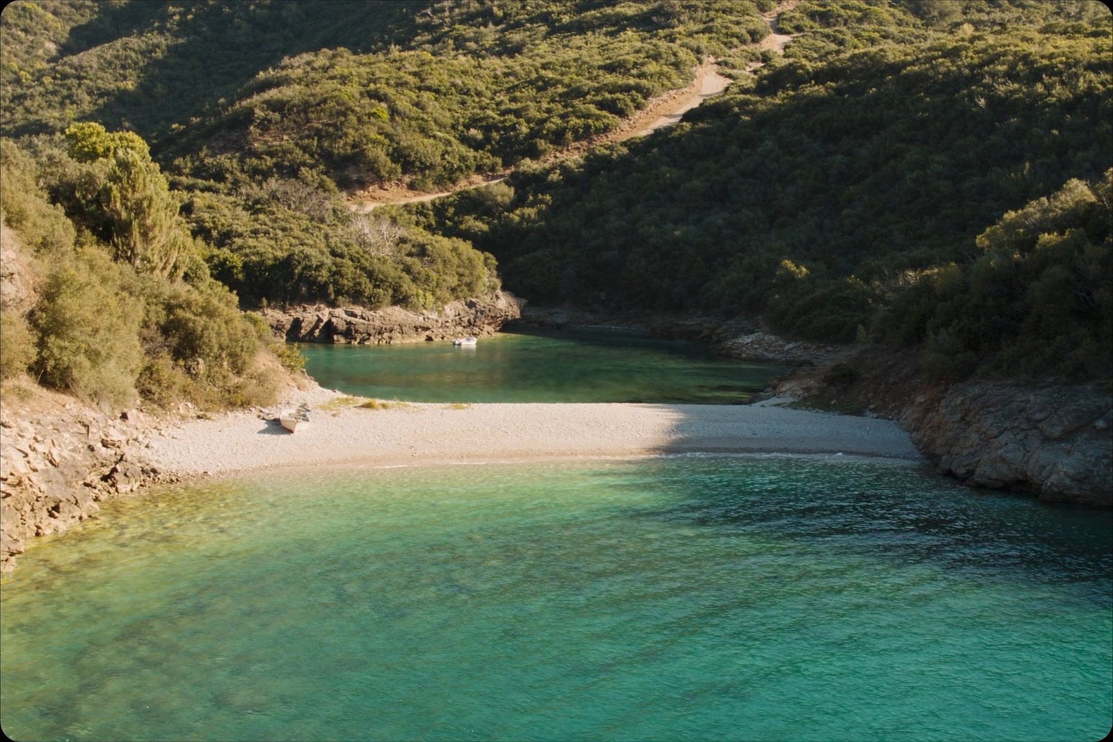 Kakome Bay: a deep clear bay with a pebble shore
