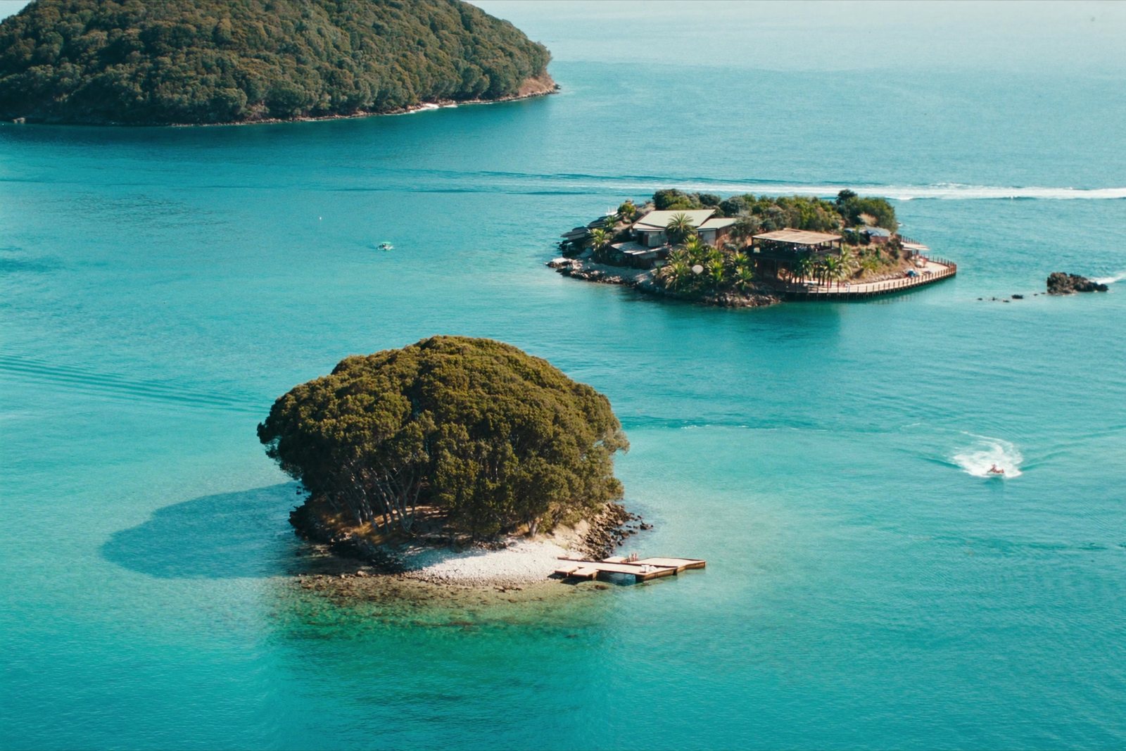 Ksamil: clear shallow water and small wooded islets