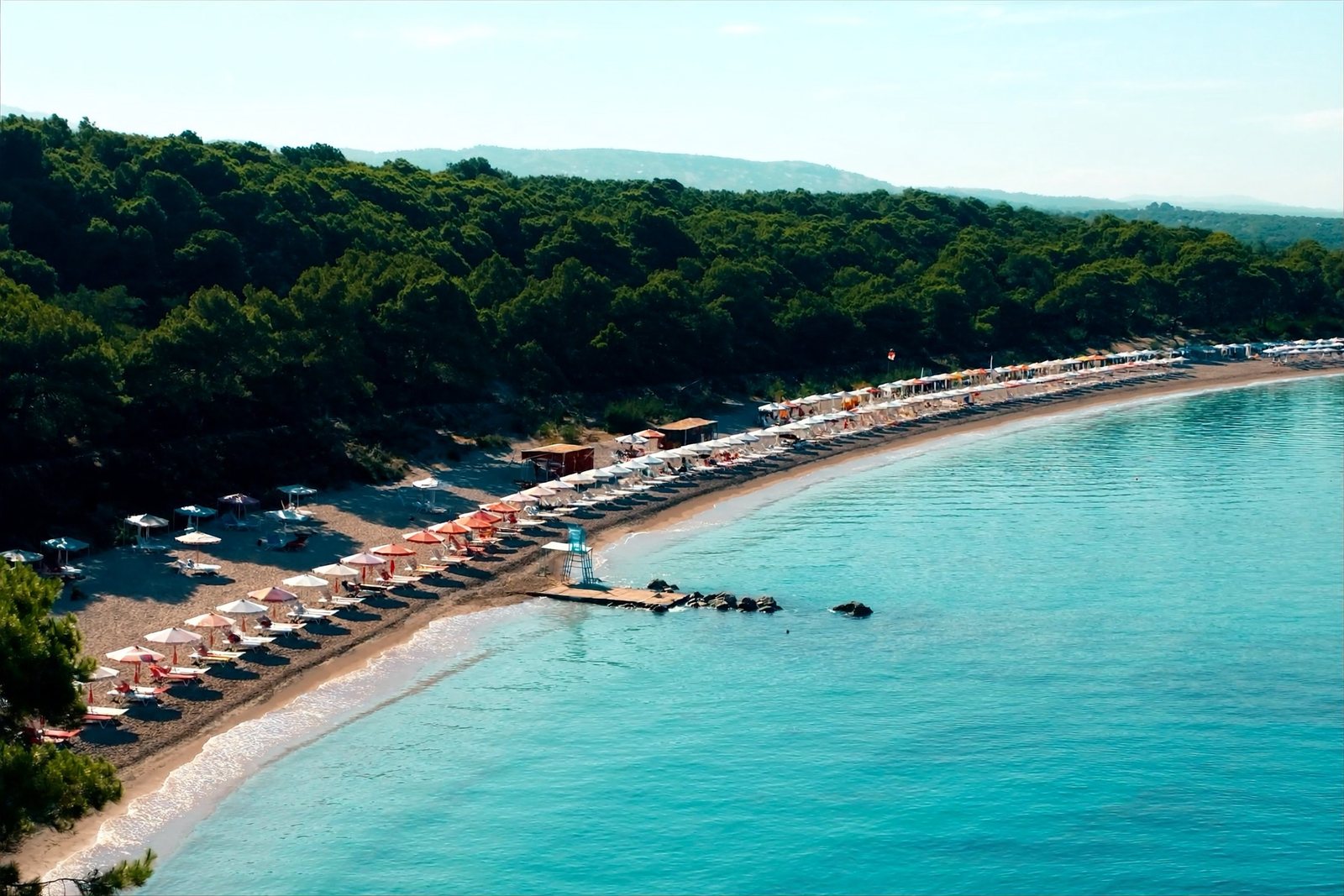 Lalzit Bay: a sand bay backed by pine woods