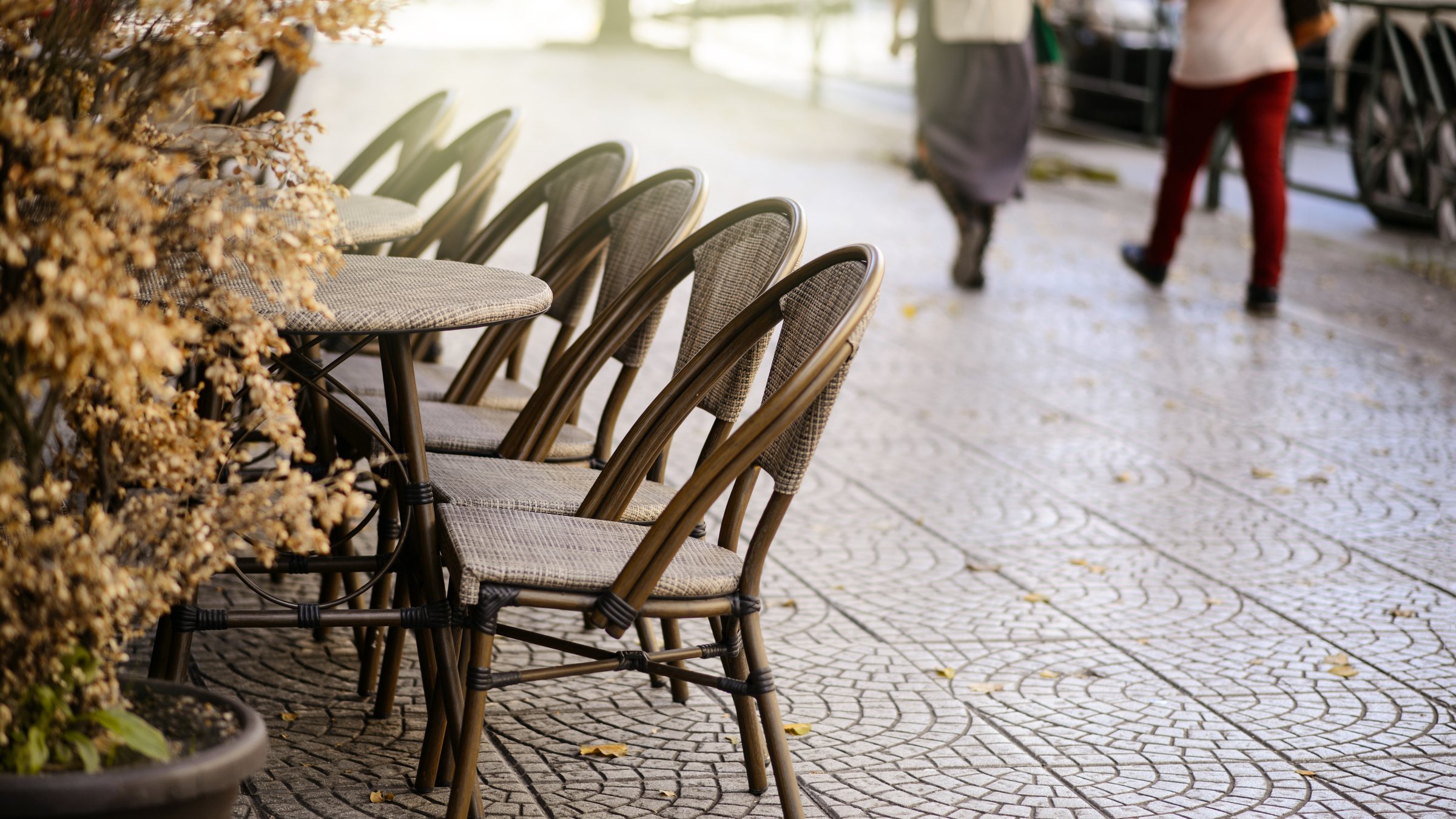 A Tirana street lined with café tables and chairs