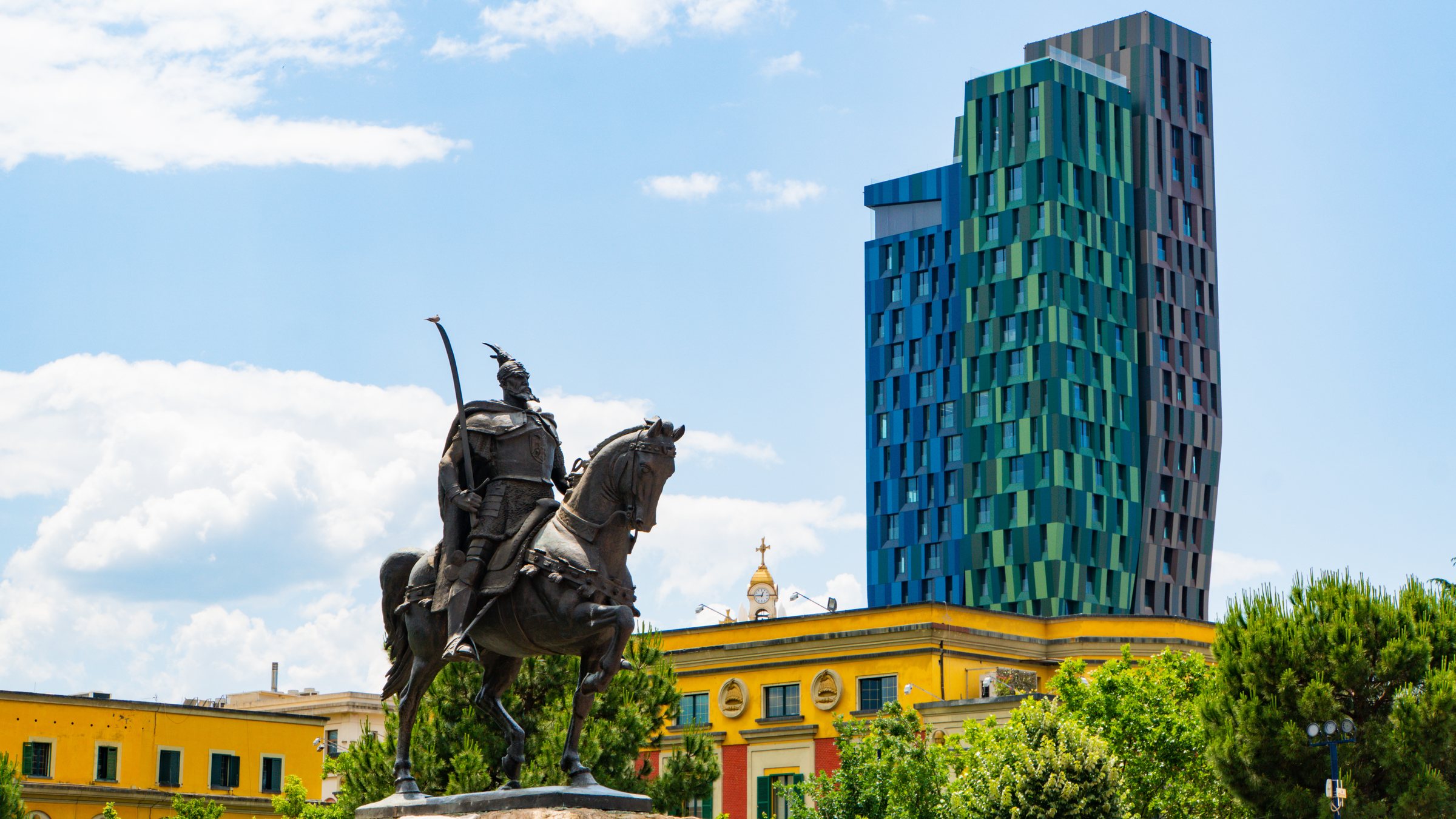 Skanderbeg Square in Tirana, Albania, with the monument of Gjergj Kastrioti and the Alban Tower behind