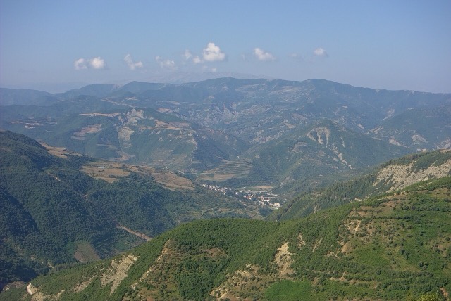 hilly landscape with the city of en:Çorovodë and the Osum valley seen from village Radesh