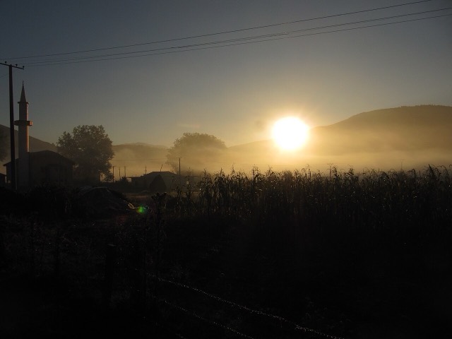 Rising fog over a field near Fushe Stude near the Shebenik Jabllanice National Park in Albania