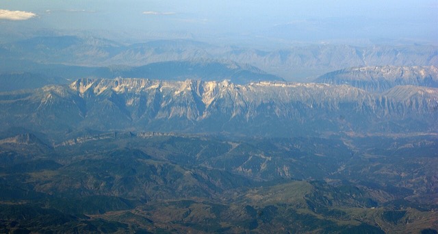 Nemërçka Mountains, Southern Albania, Eastern slopes; view around Grammos, looking southwestward over Vjose valley at Përmet and Drino vally at Dropull behind
