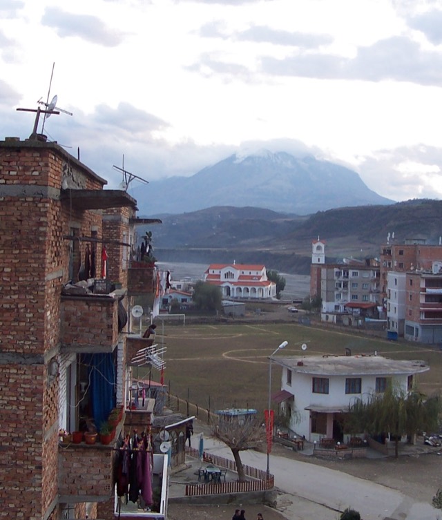 Gramsh, Albania: Orthodox church, football field, and Mount Tomor
