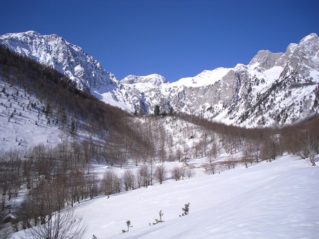 Southern view of the hanging glacial valley of Kukaj, a Natural Monument of Albania. Notice the summit of Mt. Jezercë (2694) in the central horizon.
