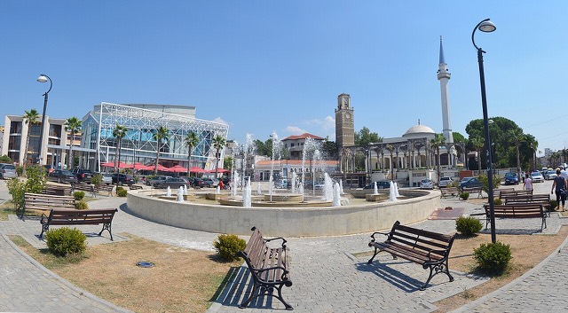 The main square (Sheshi Demokracia) in Kavajë, Albania with the Kubelie Mosque and the Watch Tower in the background