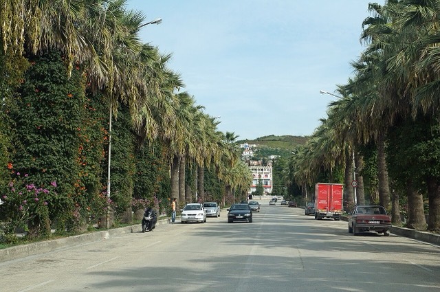 Boulevard leading to the main square in downtown Kuçovë, Albania