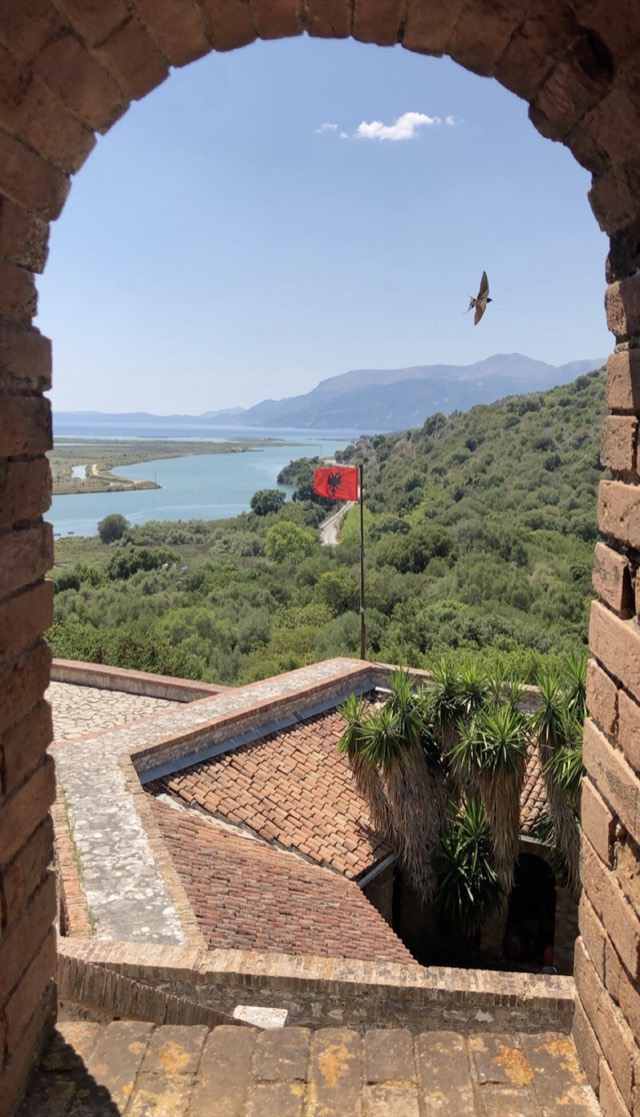 The Albanian flag at the Butrint National Park in Albania.