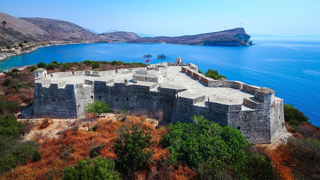 Porto Palermo Castle on its peninsula, from the air