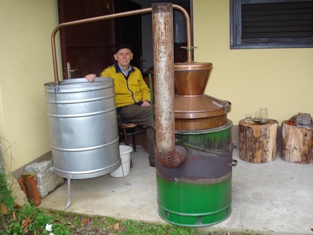 Traditional distillation of rakia (plum brandy) in Medjimurje (Croatia)