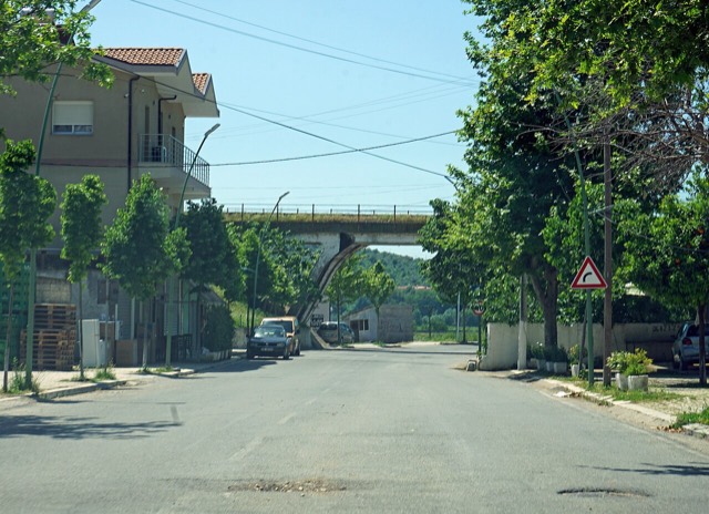 Railroad in Rrogozhinë (Southern city limits) overpassing a road – Albania