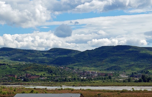 The town of Selenica in Southern Albania seen from North across Vjosa river